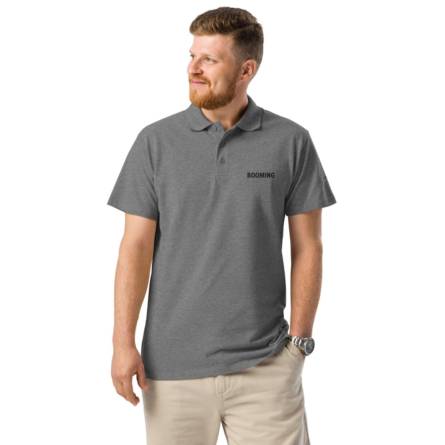 Premium pique polo shirt for men and women, featuring a classic design with a comfortable fit, ideal for casual or business casual wear, grey front view - Omshway Store