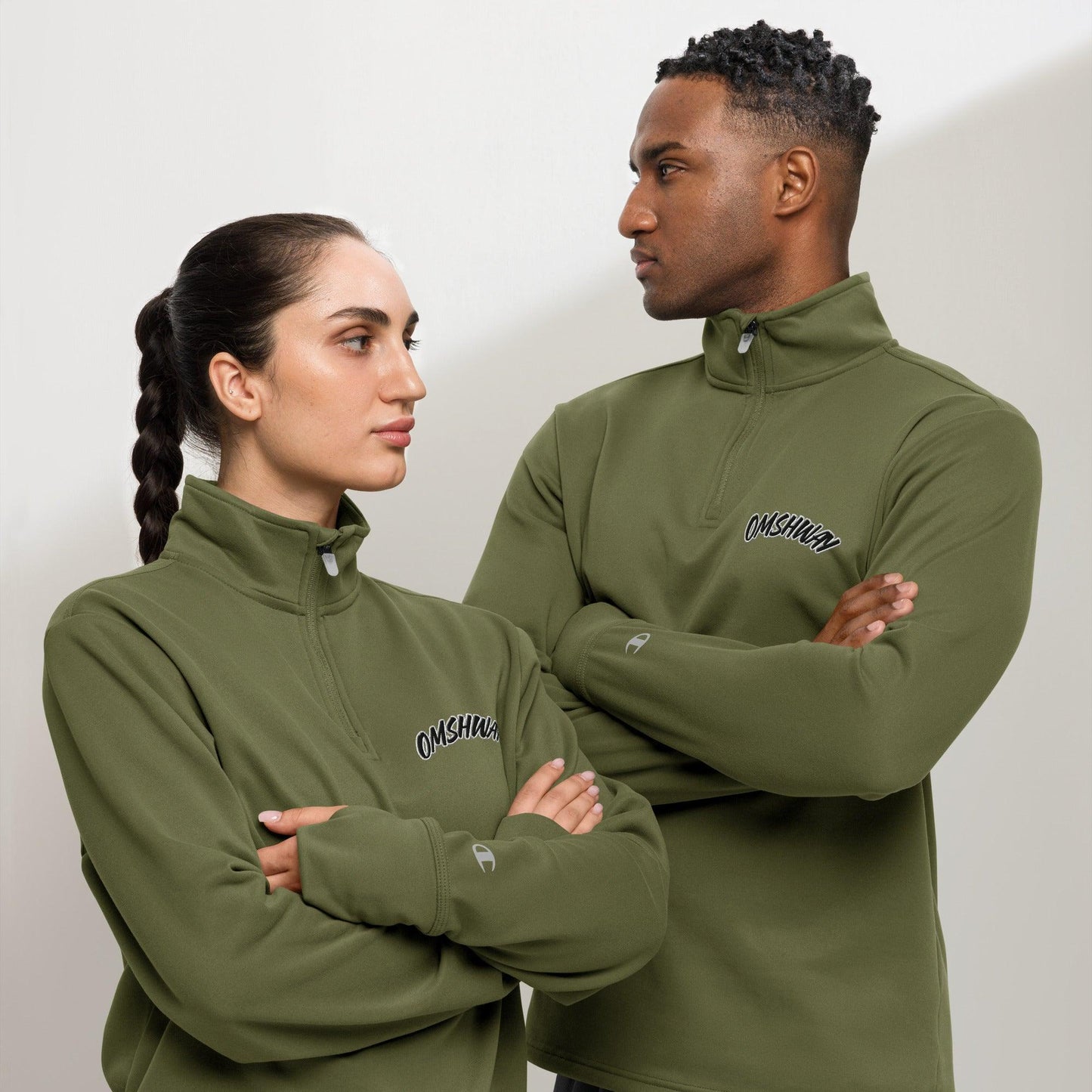 Omshway Quarter Zip Pullover featuring an embroidered Omshway logo on the chest, with a sleek, comfortable design and a high-quality zipper, olive front view