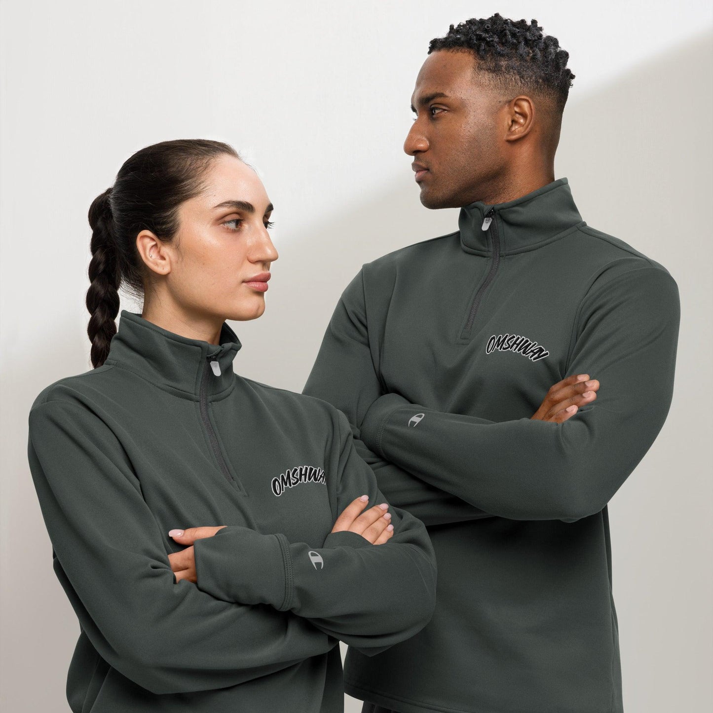 Omshway Quarter Zip Pullover featuring an embroidered Omshway logo on the chest, with a sleek, comfortable design and a high-quality zipper, stealth front view