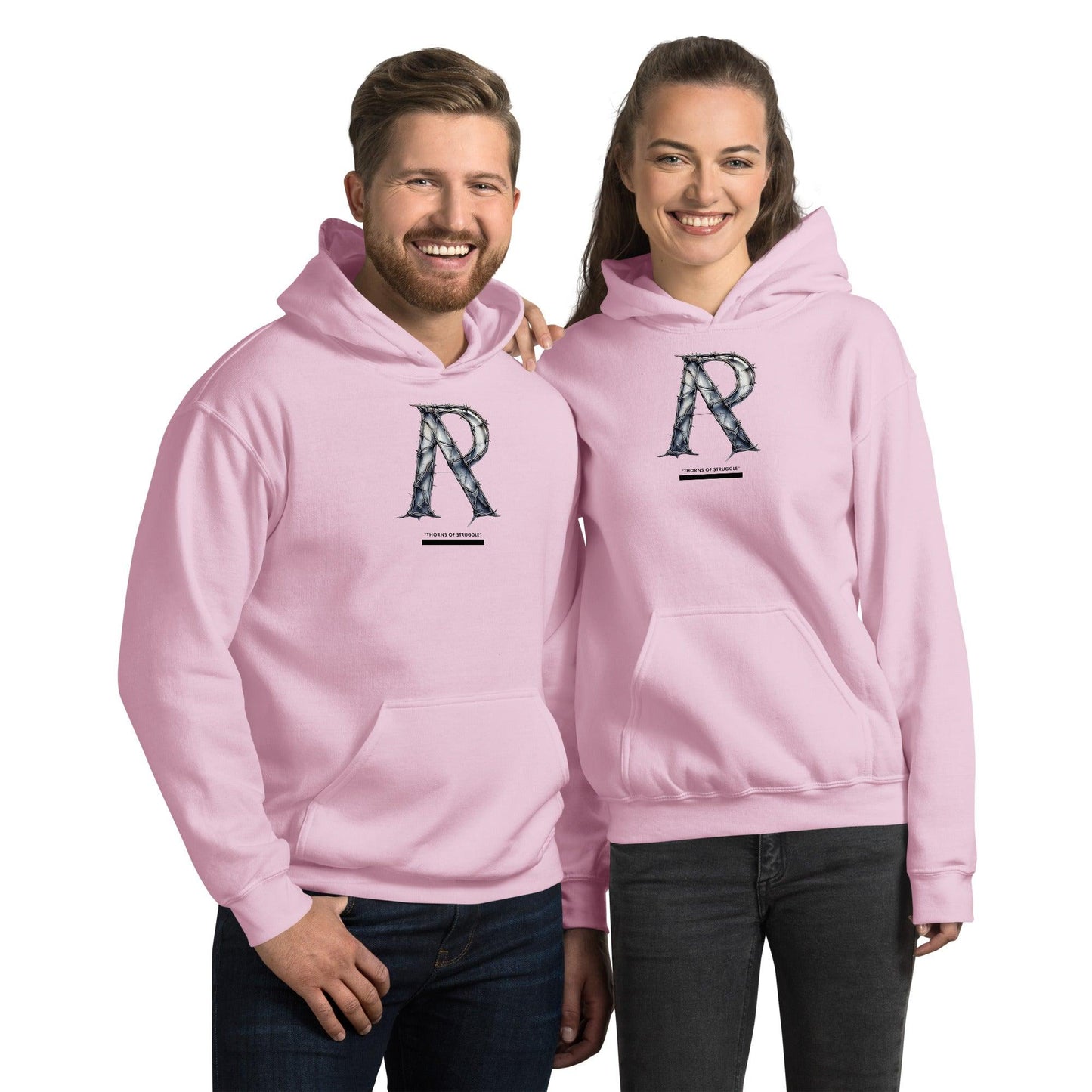 Omshway Unisex Hoodie featuring 'THORNS OF STRUGGLE' graphic, soft fabric, adjustable hood, and a comfortable, stylish fit for casual wear, pink front view - Omshway Store