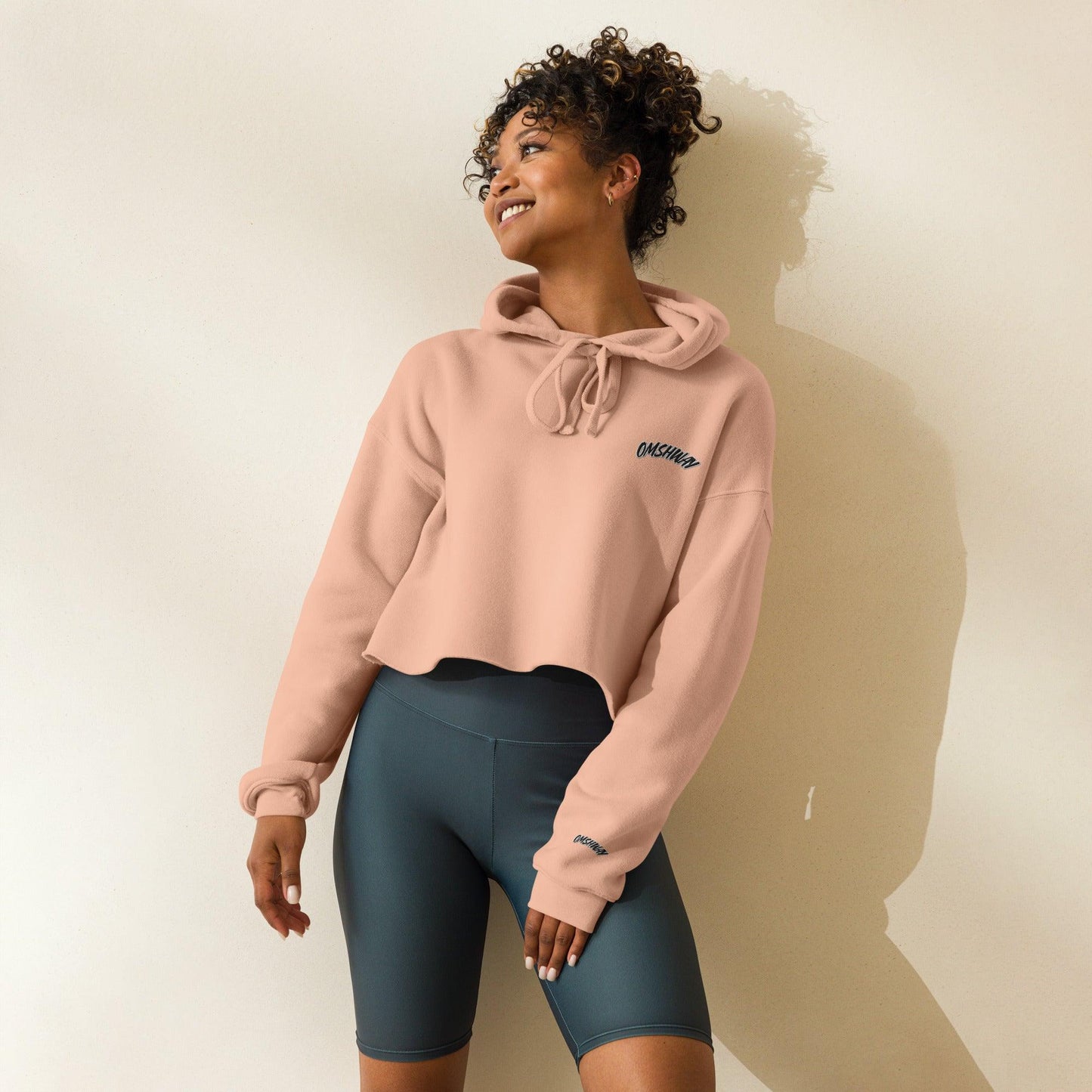 Omshway Crop Hoodie featuring a stylish, modern design with a comfortable fit, perfect for casual wear and adding a trendy touch to any outfit, peach front view